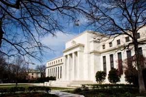 Fed may peg rates near zero until 2015