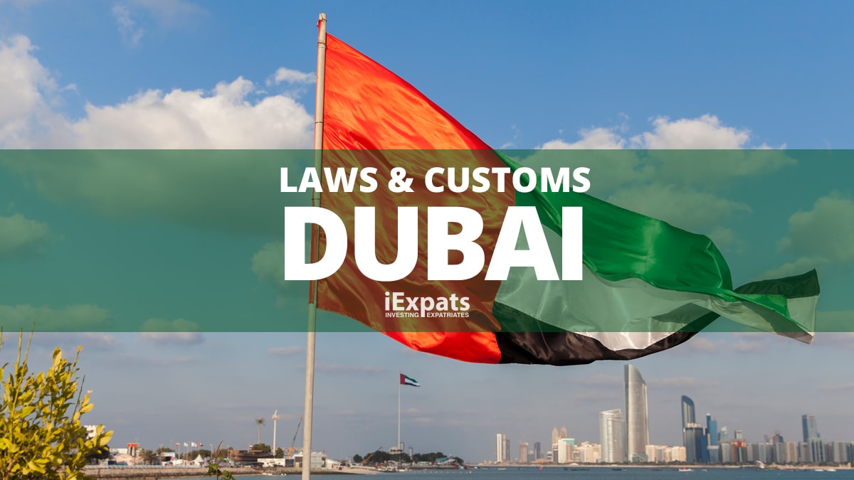 Laws and customs in Dubai with the UAE flag