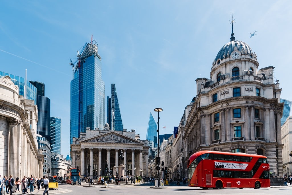 The Bank of England with red bus and skyscrapers