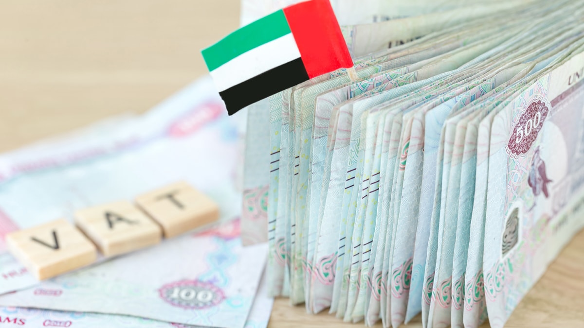 Dubai money, Dirhams, VAT and UAE flag