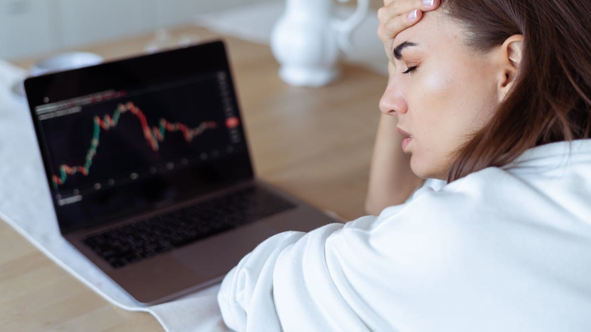 female investor worrying about bitcoin value