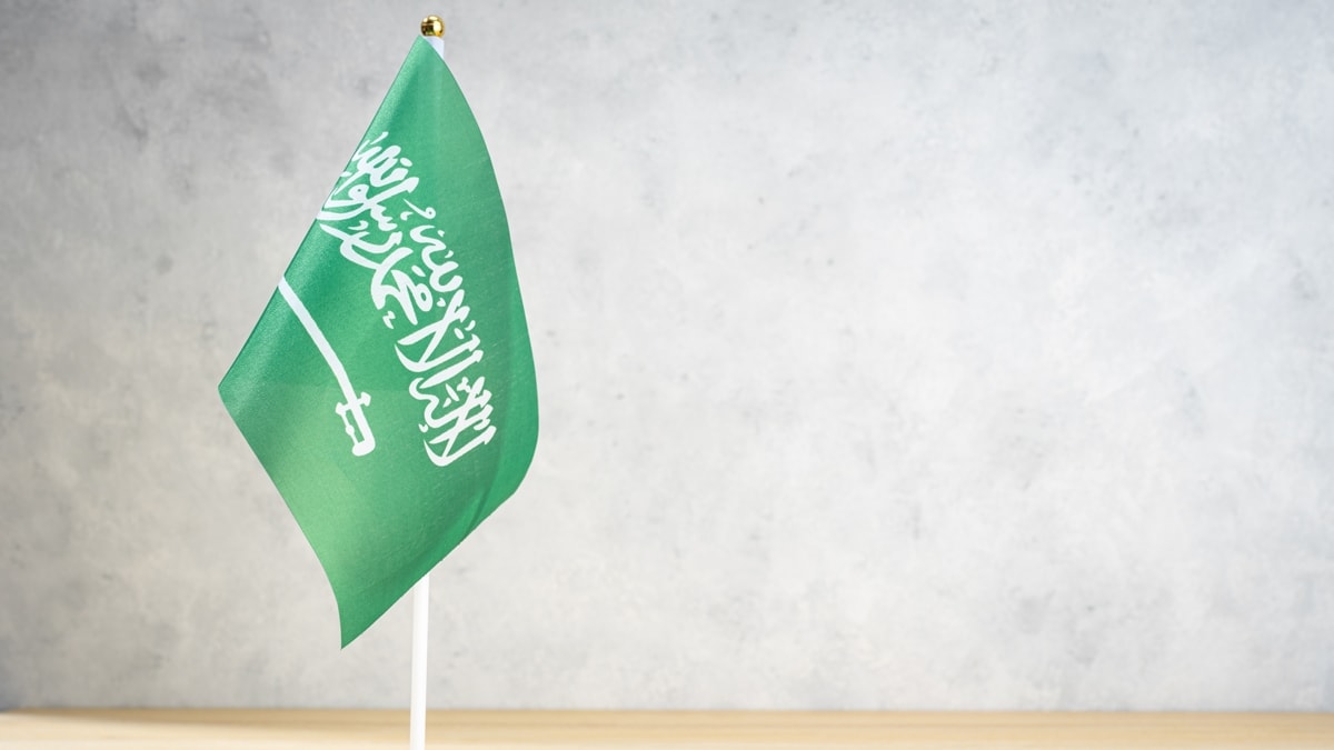 Saudi Arabia flag on a table