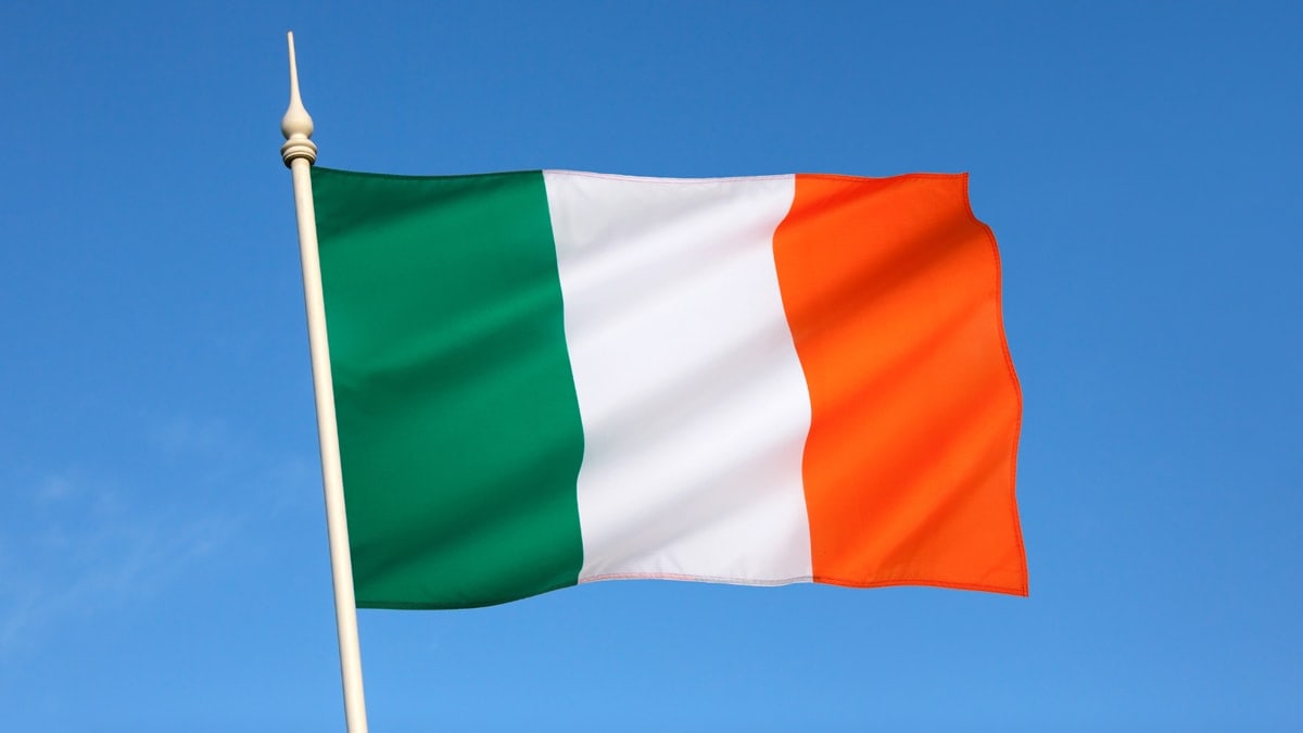 Ireland Flag with blue sky background